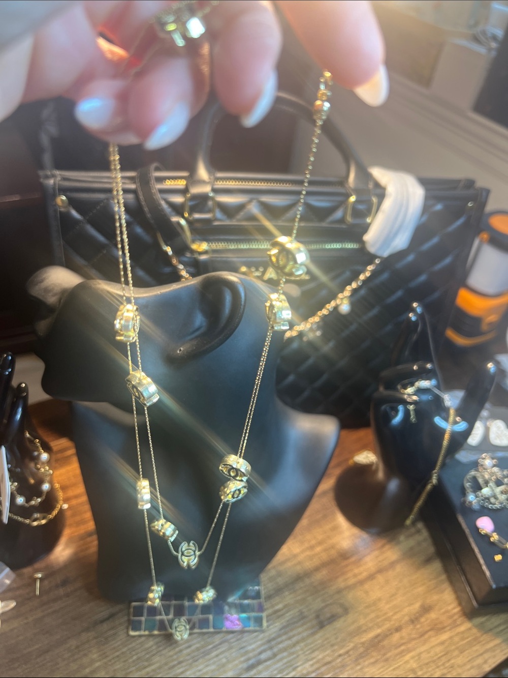 Gold-Tone Multi-Layer Logo Pendant Necklace - Picture 10 of 11